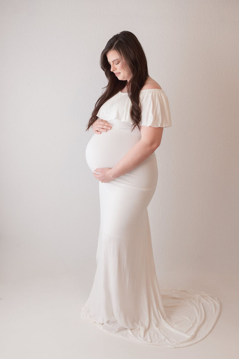 sweet white maternity gown for photo session
