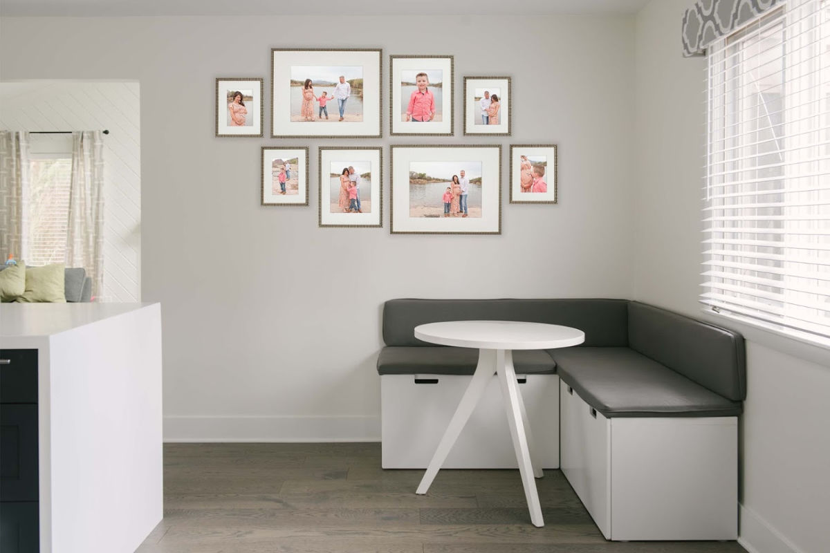 maternity family photo collage by Mesa, AZ Newborn Photographer on wall in breakfast nook