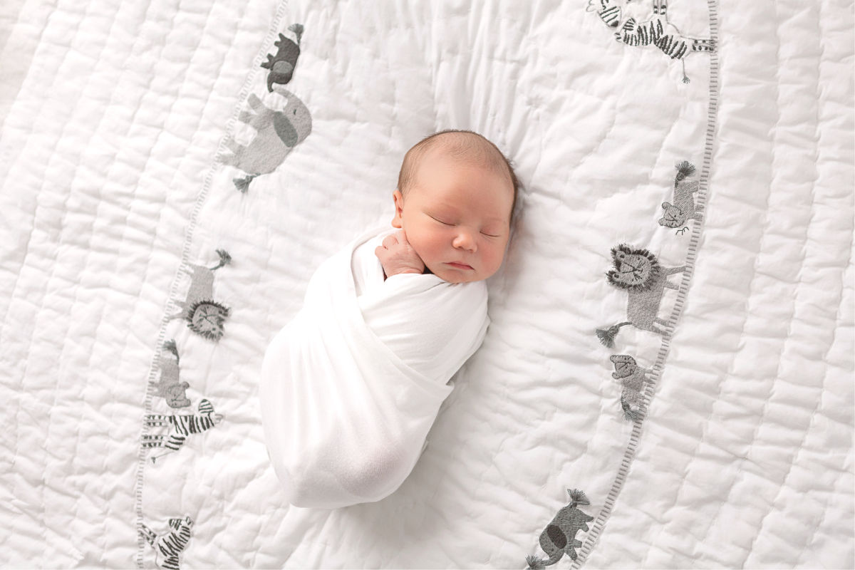 Mesa Baby Photography Newborn laying on white blanket
