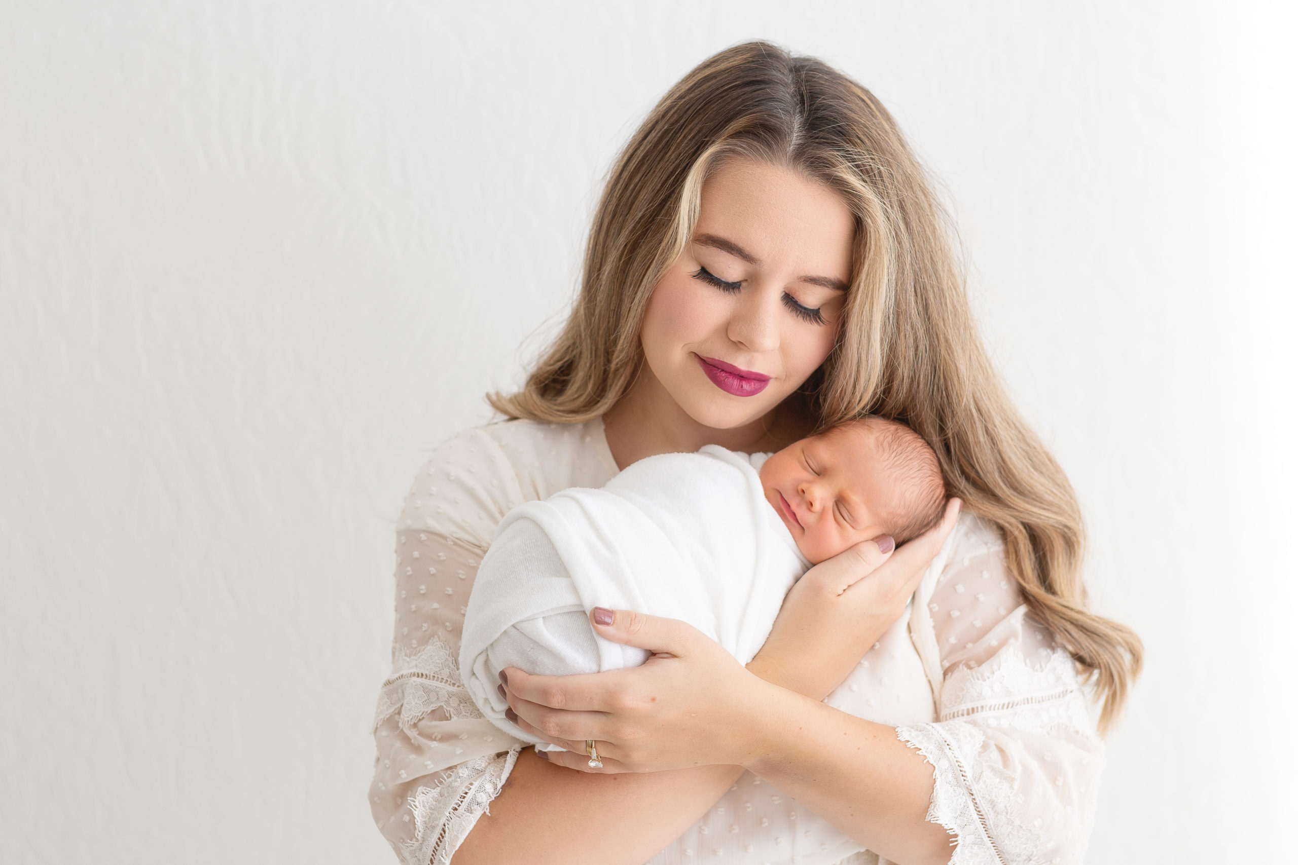 my favorite photographs are new moms with their baby